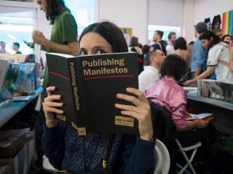 Tauba Auerbach holding Publishing Manifestos, October 2018